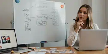 Creative small business owner planning budget branding strategies for 2025